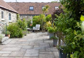 The large sheltered patio is a lovely spot for a long relaxing evening.