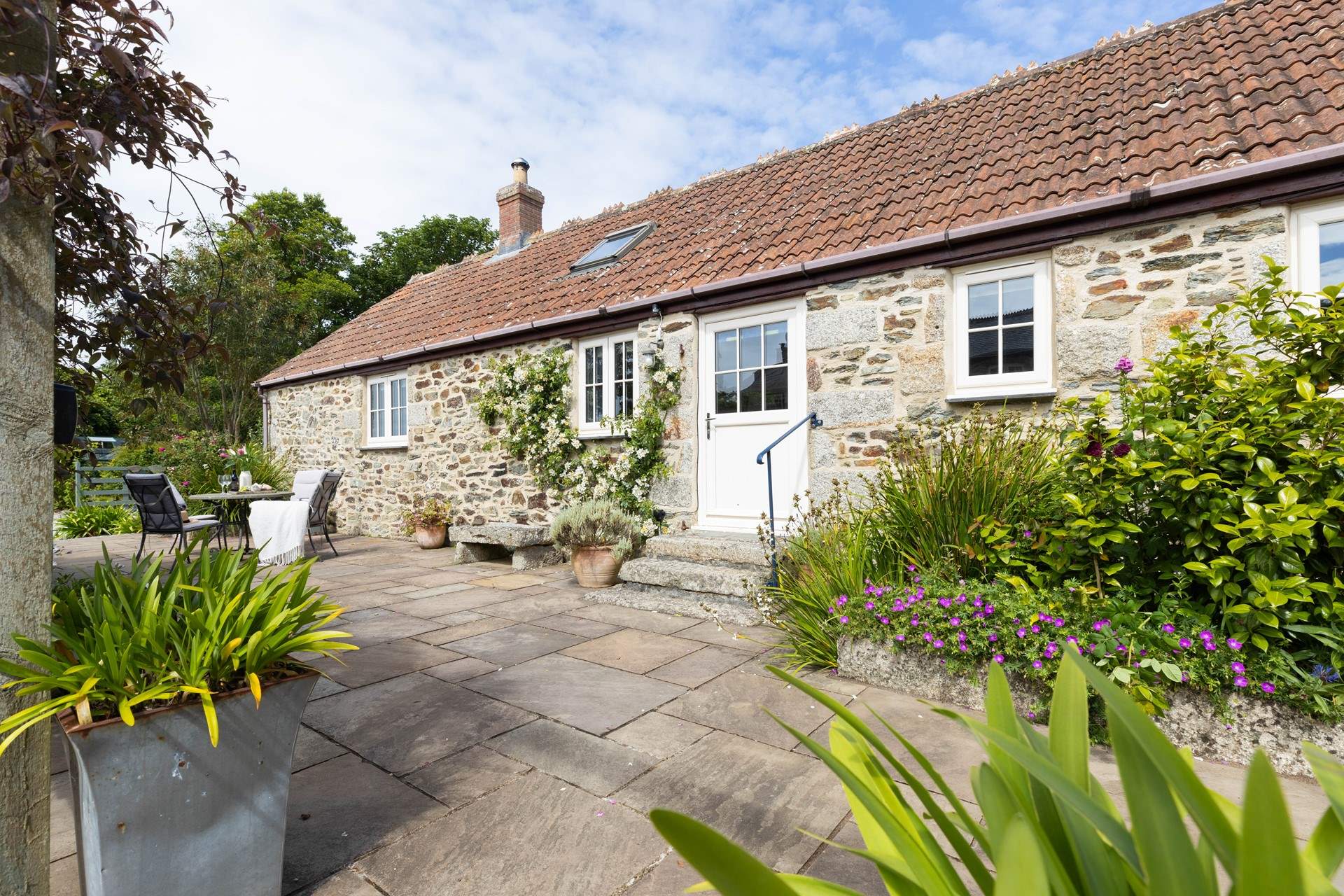Lavender Barn with private terrace looking out over the beautiful garden.