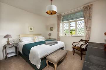 This cosy retreat is set in idyllic countryside, with the most fabulous views across the valley from the bedroom (the bed can either be made up as a king-size double or small twins).