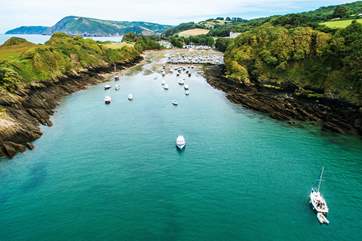 The beautiful natural harbour at Watermouth Bay lies at the foot of the hill that rises up to Lydford Farm, the setting for Wild Pear Shepherds' Hut.