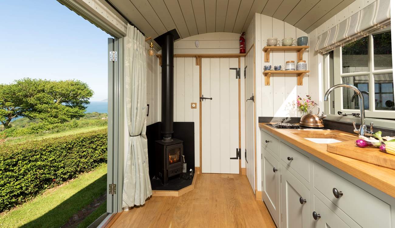 The kitchen area is complete with a two-ring hob, perfect for cooking a hearty fry-up.