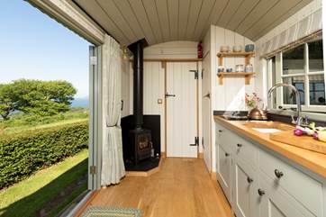 The kitchen area is complete with a two-ring hob, perfect for cooking a hearty fry-up.
