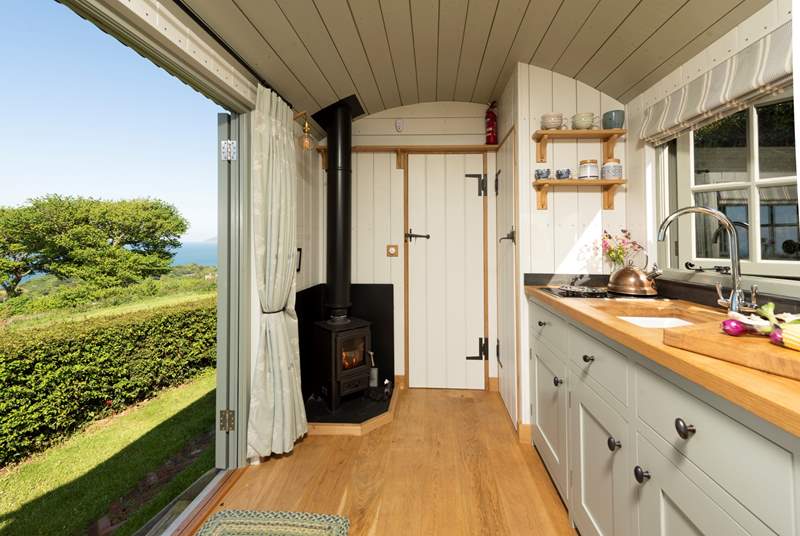The kitchen area is complete with a two-ring hob, perfect for cooking a hearty fry-up.