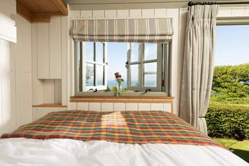 The comfy double bed converts with ease from the dining-table and benches.