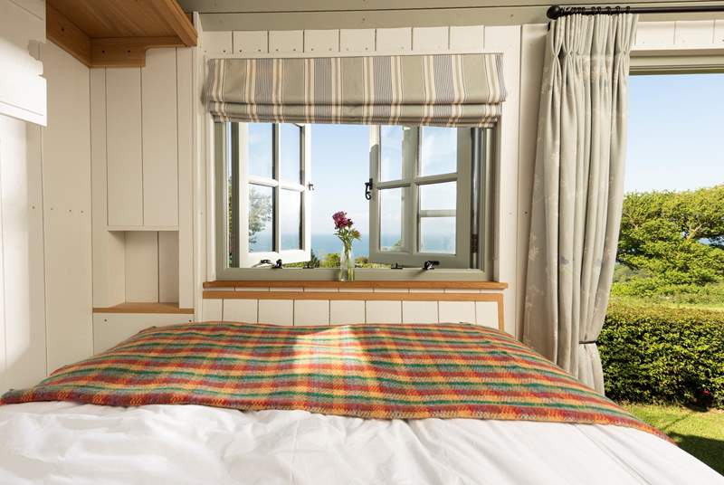 The comfy double bed converts with ease from the dining-table and benches.