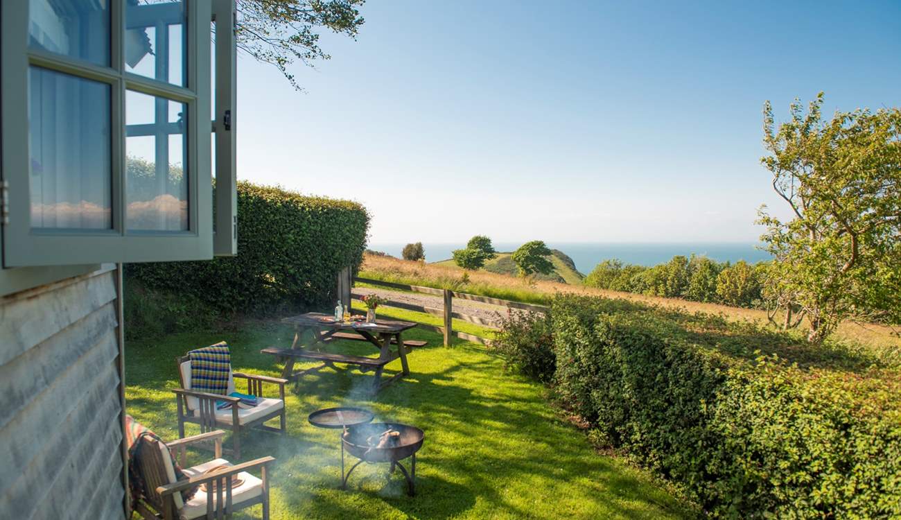 Cook up something scrummy on the fire-pit barbecue.