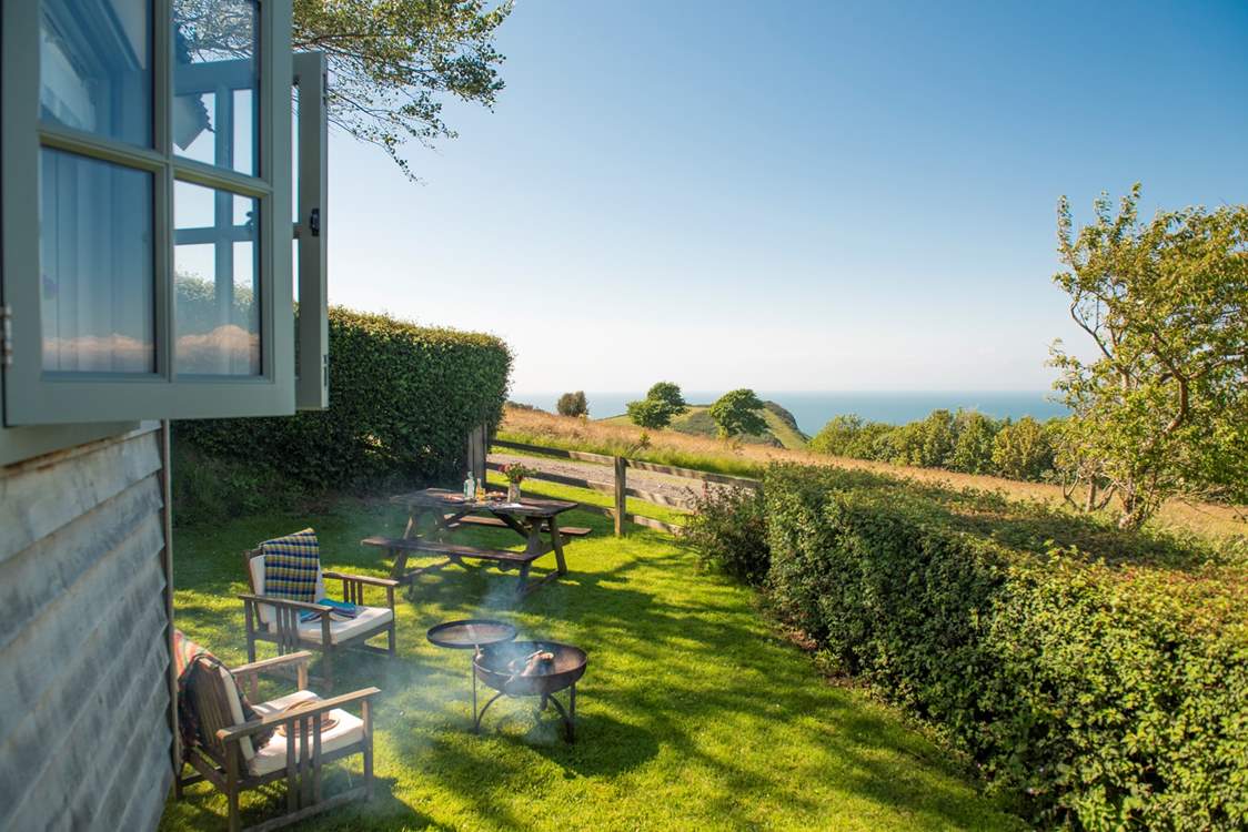 Cook up something scrummy on the fire-pit barbecue.