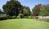 The beautiful secluded garden to the rear of the property is a lovely outdoor space in which to enjoy the sunshine. - Thumbnail Image