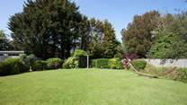 The beautiful secluded garden to the rear of the property is a lovely outdoor space in which to enjoy the sunshine.