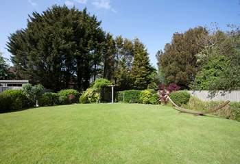 The beautiful secluded garden to the rear of the property is a lovely outdoor space in which to enjoy the sunshine.