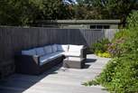 As the sunshine fills the garden, relax on one of many seating options outside.