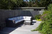 As the sunshine fills the garden, relax on one of many seating options outside.