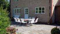 If the sun is shining, this is the perfect spot to dine al fresco.  Please note that the windows are now with grey frames.  