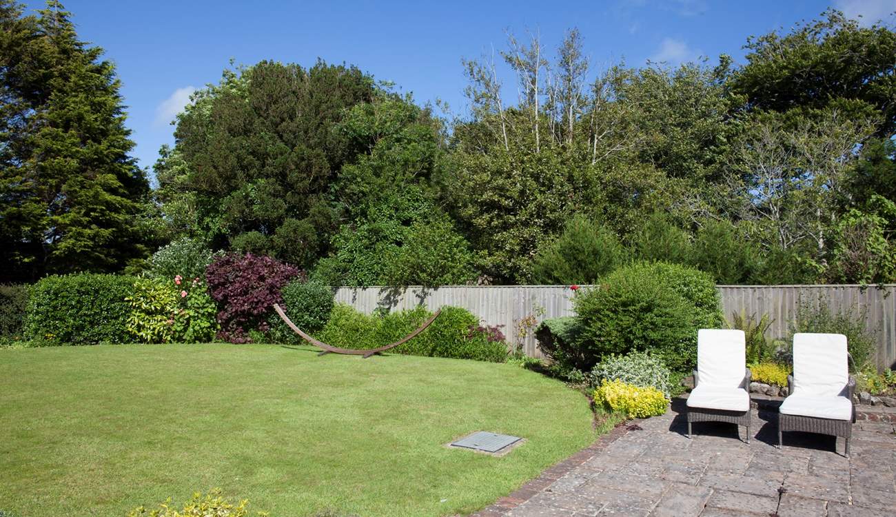 Drink in hand, sun in the sky, tan in progress.