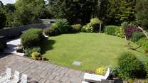 The lawn is a perfect space for children to run around and play.