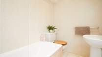 ...the en suite bathroom to Bedroom 4.