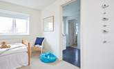 The children's bedroom leading through to the shared bathroom. - Thumbnail Image