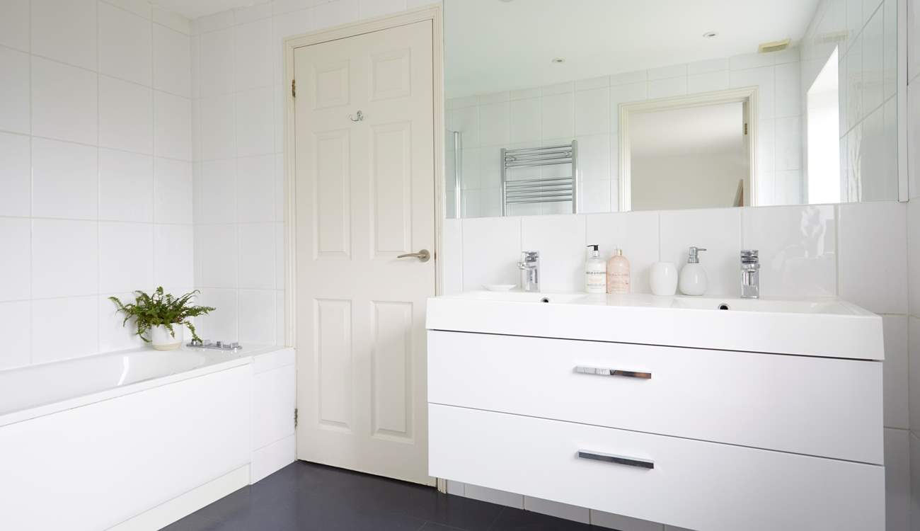 The large shared bathroom to the king-size double bedroom and bunk bedroom.