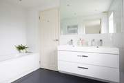 The large shared bathroom to the king-size double bedroom and bunk bedroom.