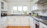 The large kitchen gives you plenty of space and everything you need to prepare those favourite meals. - Thumbnail Image