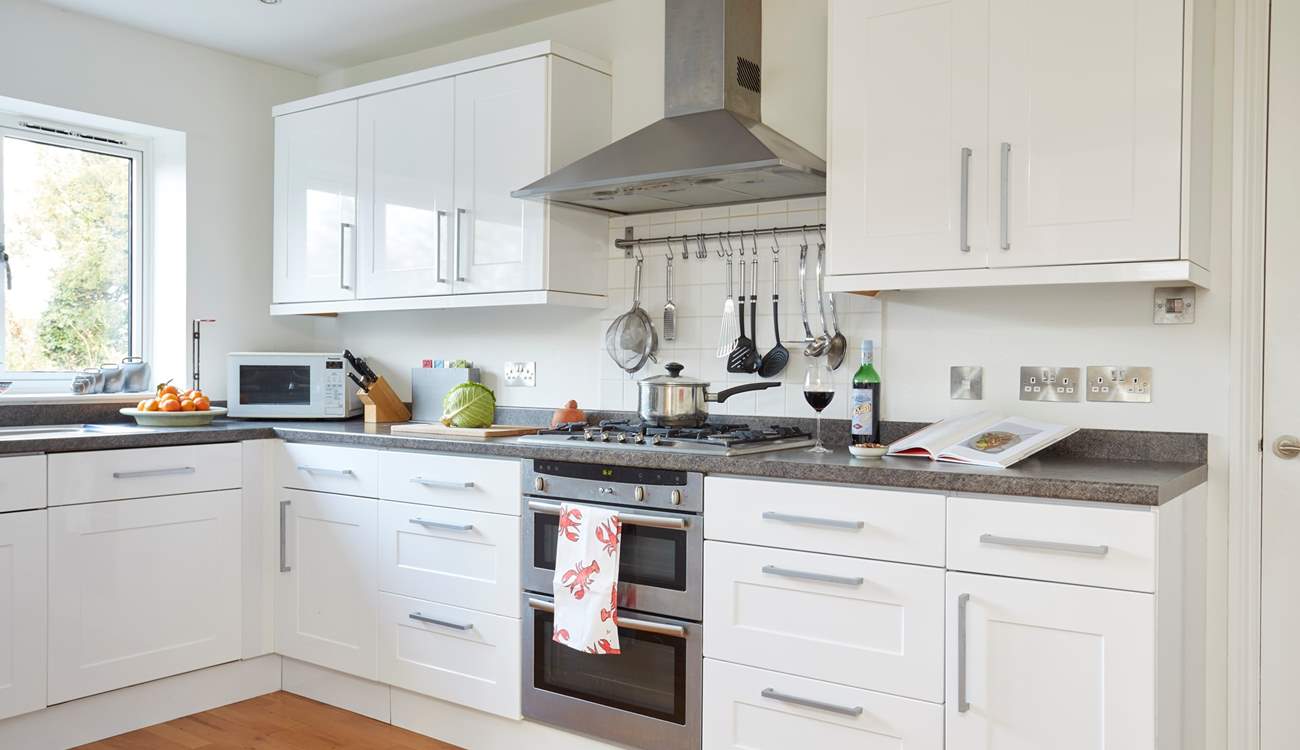 The kitchen with all the modern appliances to make a tasty meal.