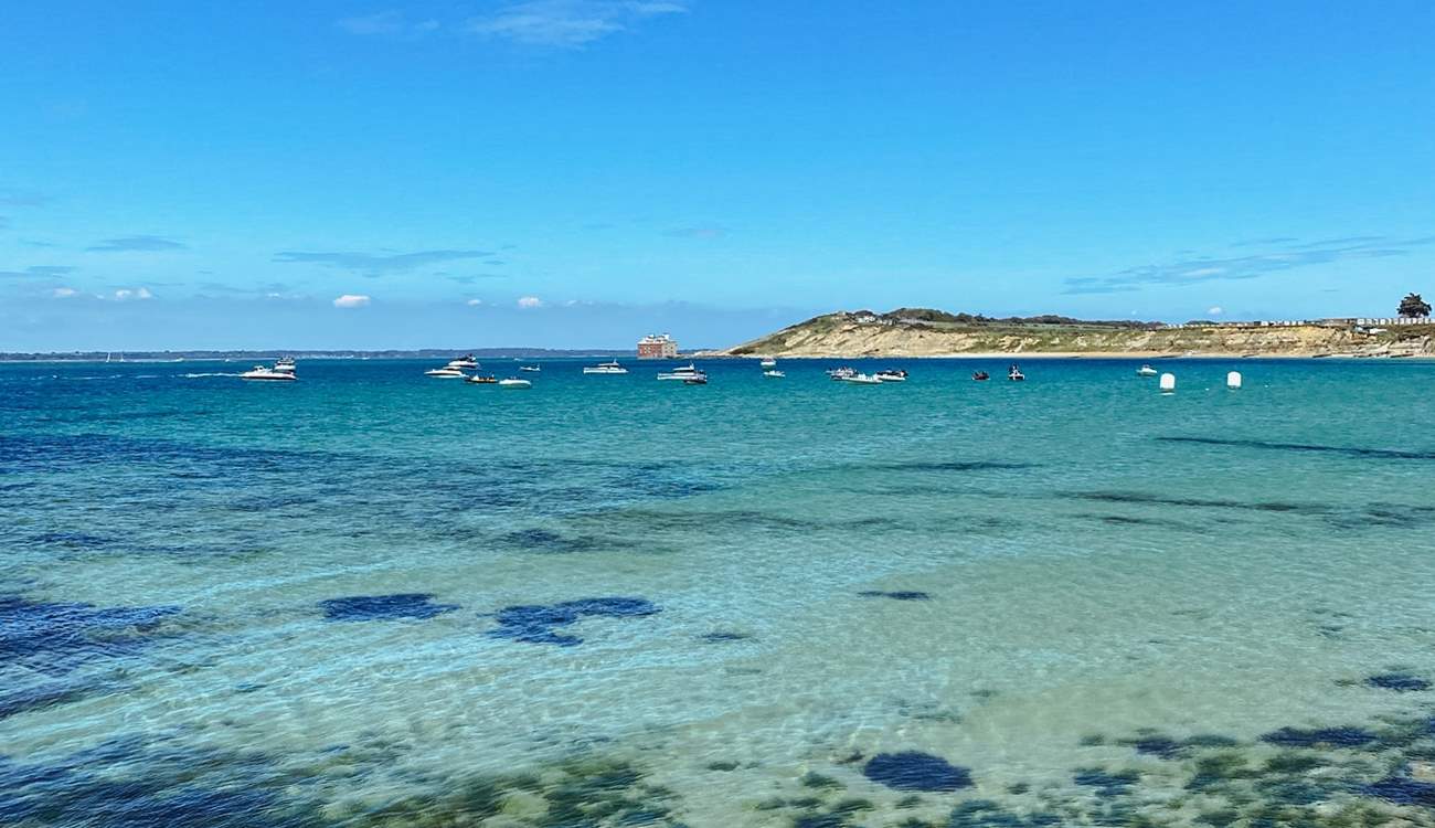 Totland Bay where you will find The Hut restaurant a popular destination by land or sea.