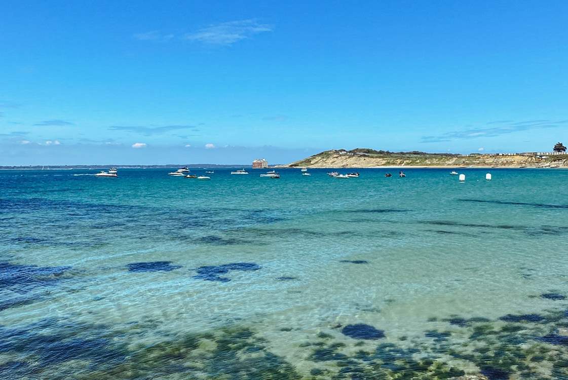 Totland Bay where you will find The Hut restaurant a popular destination by land or sea.