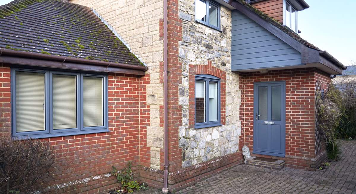 Welcome to the New House with the recently replaced front door and windows in grey. More exterior photos to come in 2024.