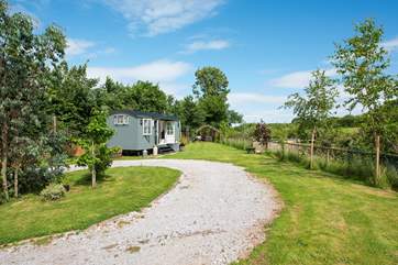 The gravelled track provides both a parking-area and turning circle, all private to you.