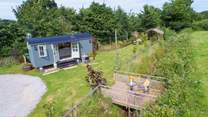 Duck's Puddle is in its own garden setting with a lovely additional seating-area on the bridge over the stream.