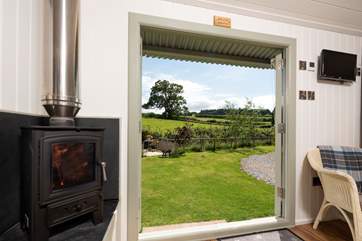 The wood-burner will keep you toasty whatever time of year.