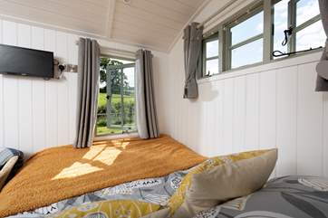 There is a window at the end of the comfy king-size bed, so you can enjoy a lie-in with a view.