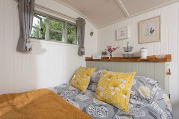 There is a comfy king-size bed with lovely linens.