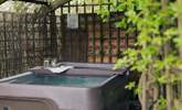 The heavenly hot tub... where romantic moments await. - Thumbnail Image