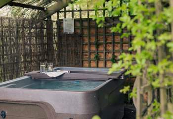 The heavenly hot tub... where romantic moments await.
