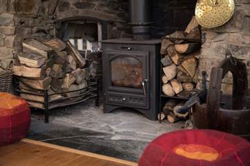 The beautiful wood-burner is the perfect complement to a cosy night in.