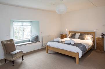 The master bedroom is extremely light and spacious.