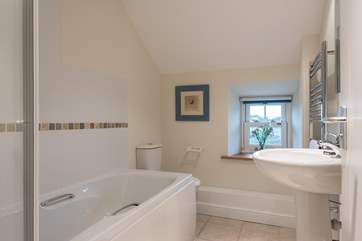 The family bathroom is on the first floor between the twin and double bedrooms.