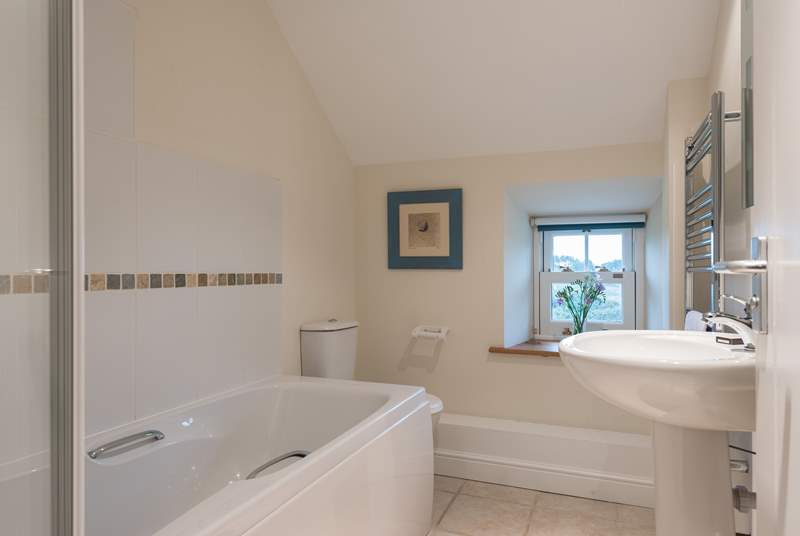 The family bathroom is on the first floor between the twin and double bedrooms.