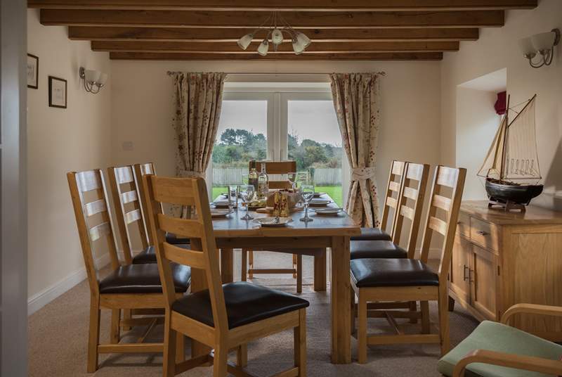 Room to dine with family and friends with views across the garden.