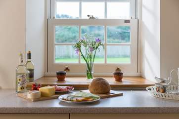 The kitchen overlooks the garden.