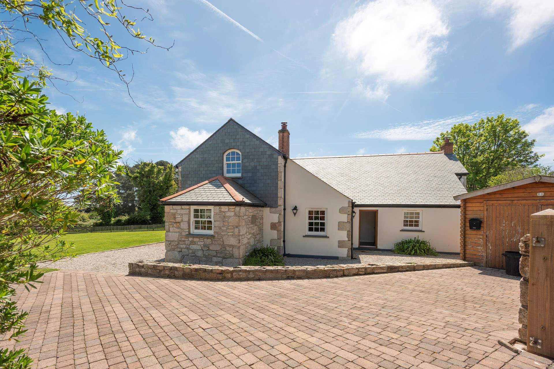The spacious wrap-around driveway.
