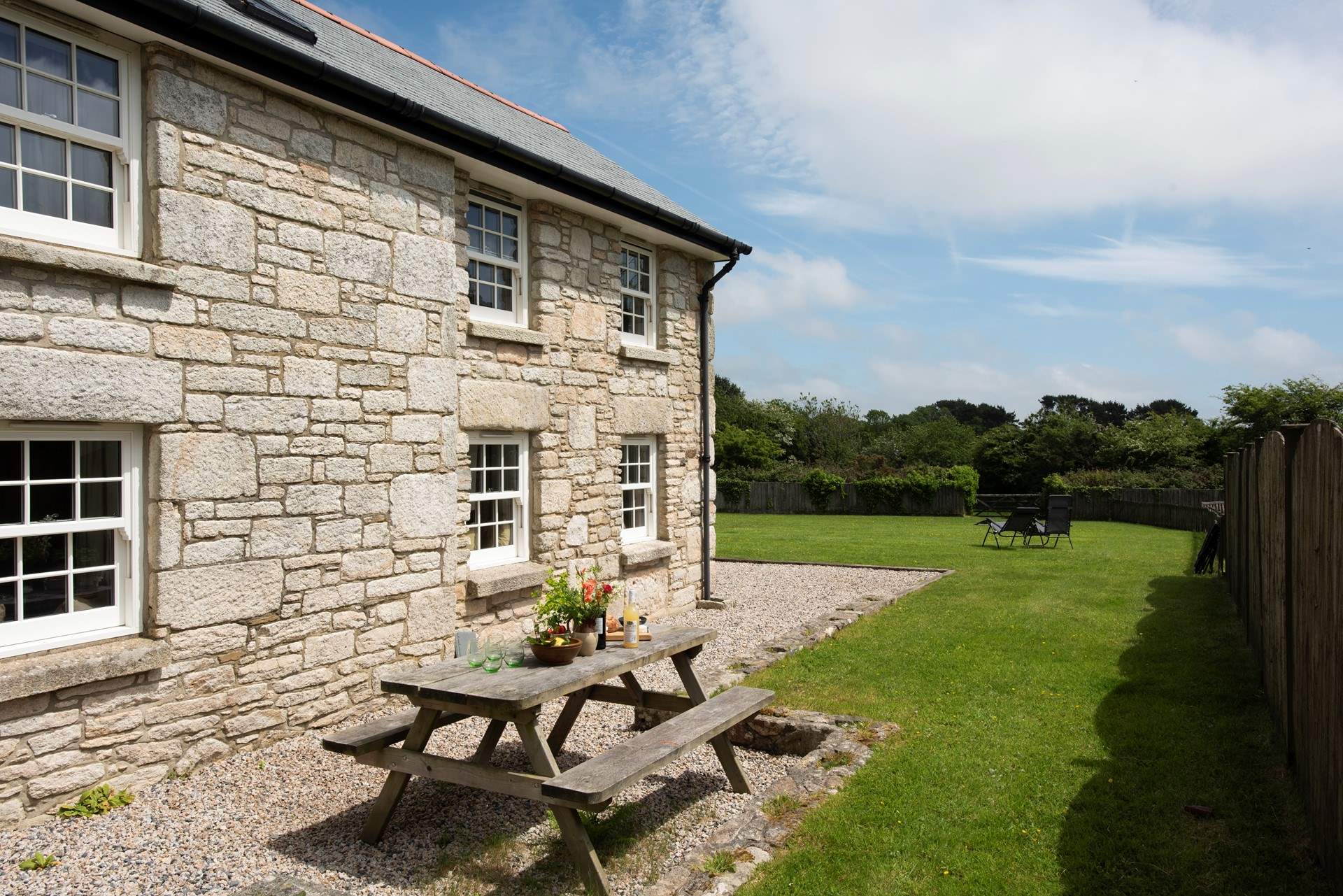 The side elevation has a space for laid back picnics.