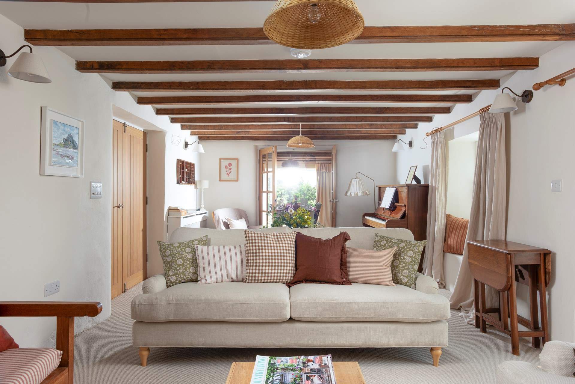 The dining area has double doors to the sitting-room.