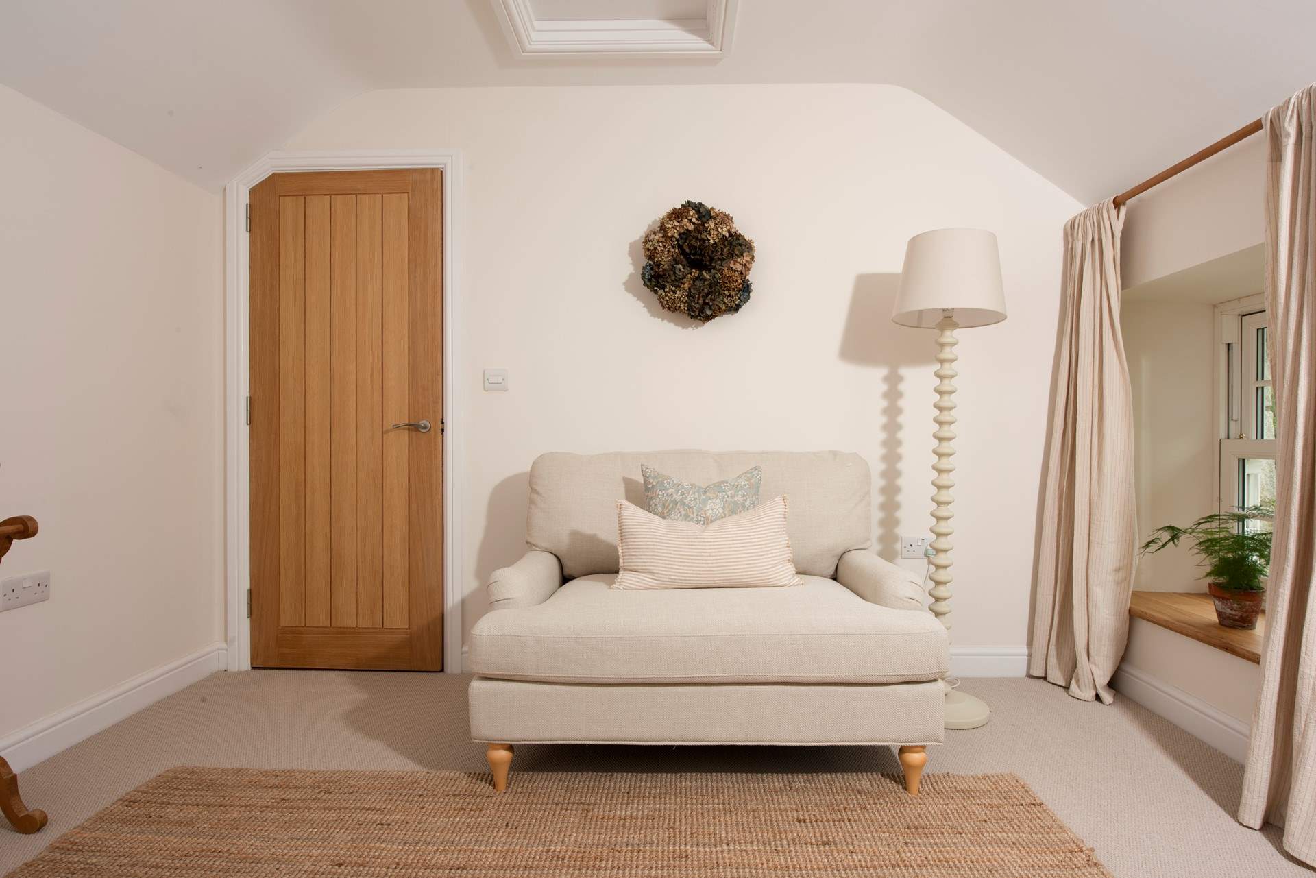 Enjoy a good book in the comfy bedroom in the main suite.