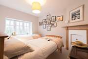 Bedroom 5 with twin beds.