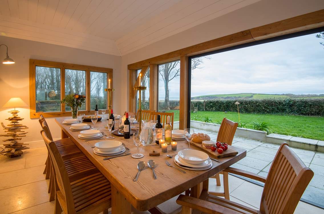 The triple doors open out to the terrace.