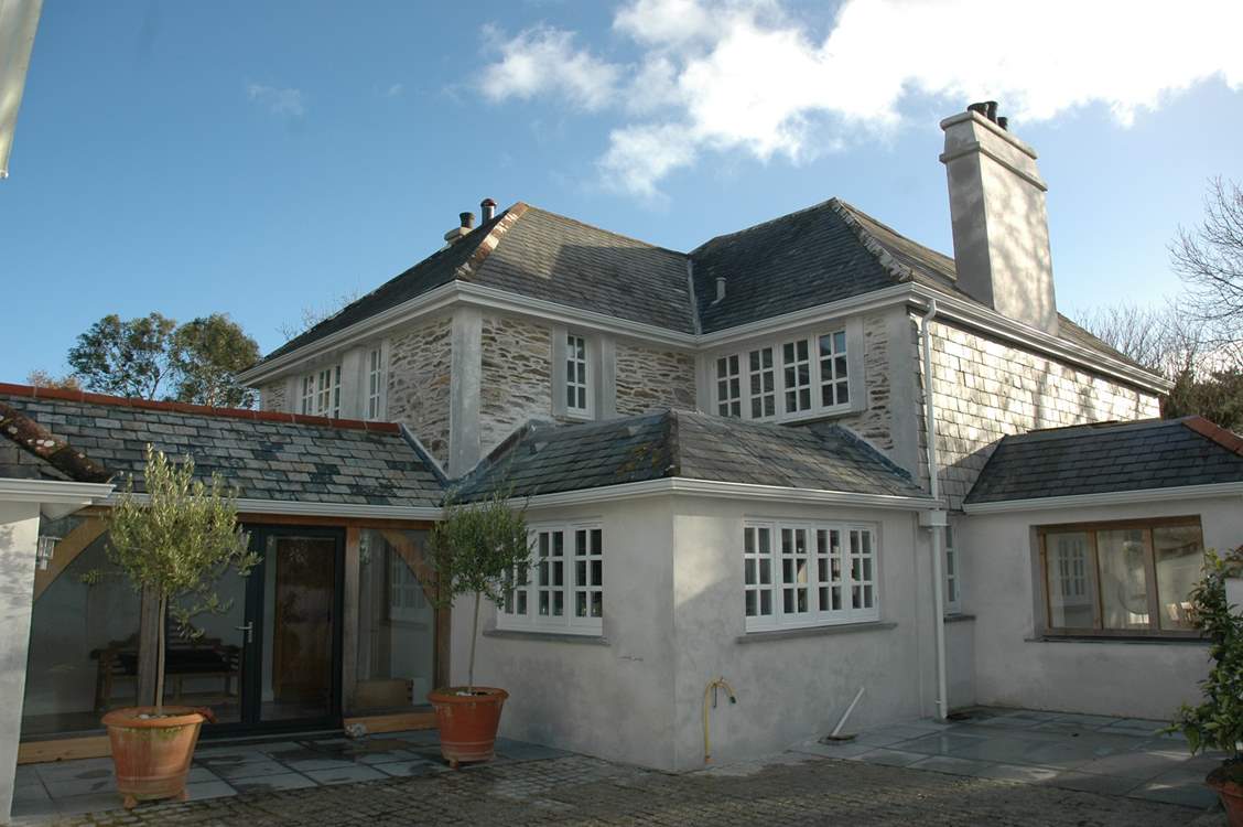 The rear of Rosteague Farmhouse faces on to the sunny courtyard.