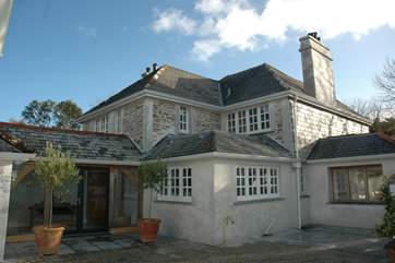 The rear of Rosteague Farmhouse faces on to the sunny courtyard.