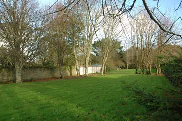 The large garden is fully enclosed.